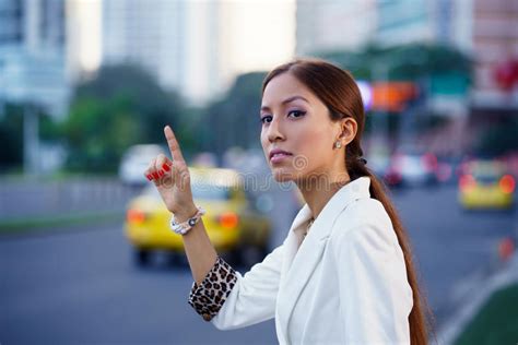 Latina Businesswoman Calling Taxi Car Leaving Work Stock ...