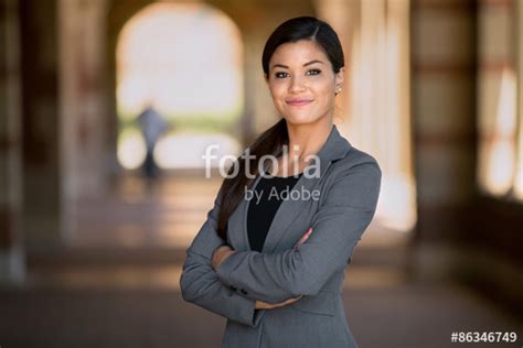 Confident business woman with successful expression mixed ...