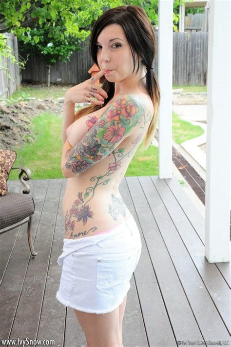 Busty tattooed girl Ivy Snow stripping on her patio ...